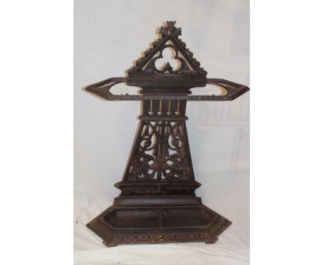 A Victorian cast iron Art &amp; Crafts-style stick stand with raised and pierced decoration, 30½" high