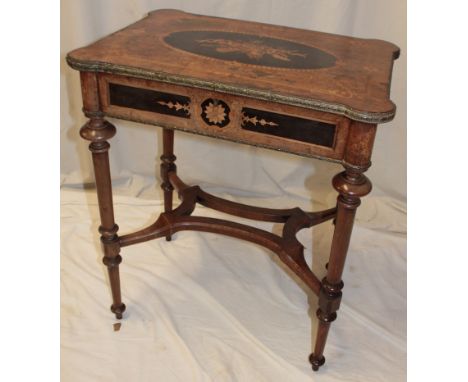 A 19th century inlaid walnut and marquetry parlour table/work table, the satin lined interior enclosed by a hinged lid with i