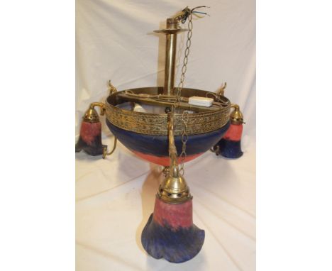 An unusual brass ceiling light with blue and pink tinted central domed shape flanked by three smaller shades