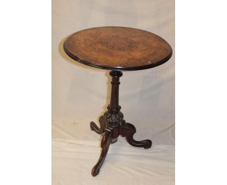 A Victorian inlaid walnut circular occasional table with decorated top on tapered column and carved tripod base, 20½" diamete