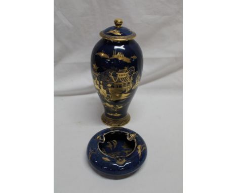 A Carltonware china baluster-shaped vase and cover with gilt Eastern scene decoration on blue ground, 9" high together with a