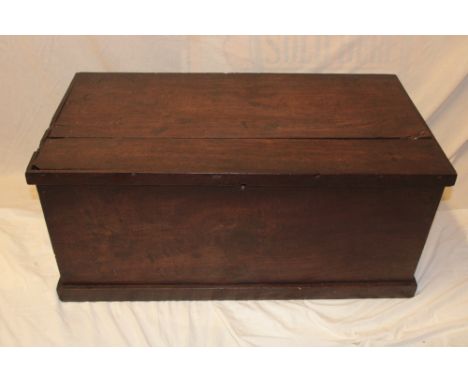 An old polished elm rectangular trunk with hinged lid, 35½" long