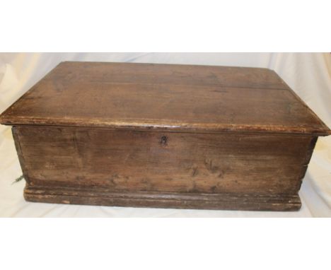 A 19th century stained pine rectangular trunk/bible box enclosed by a hinged lid, 29½" long x 10" high