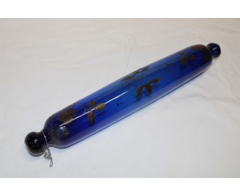 A 19th century Bristol blue tinted glass rolling pin with painted floral decoration, 14" long