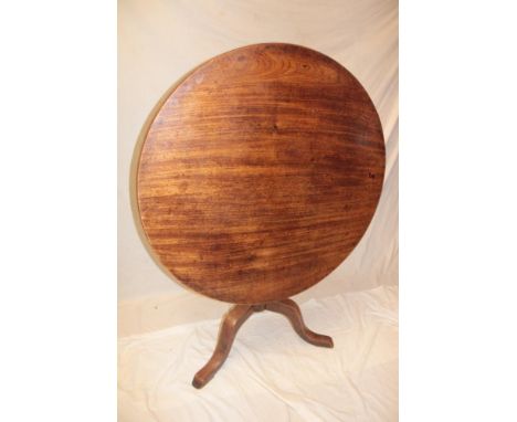 A 19th century mahogany circular snap-top occasional table with turned column and tripod base