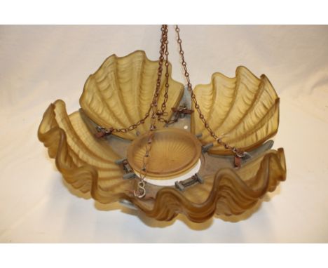 A 1920s chromium plated hanging light shade with amber tinted clam shell mounts