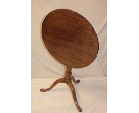 A 19th century oak circular snap-top occasional table on turned column with tripod base