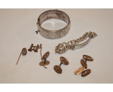 A silver oval bangle, silver ID bracelet, gilt cufflinks etc