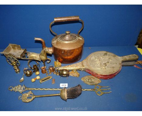 A quantity of brass and copper to include a copper kettle, bellows, horse and cart, miniature miners lamp, etc.