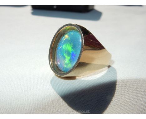 A 14ct (585) inset opal ring, marked DSD with a London imported stamp mark, date letter 'V' 1995.