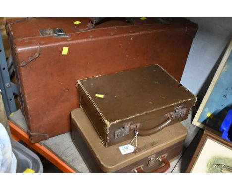 Three vintage suitcases