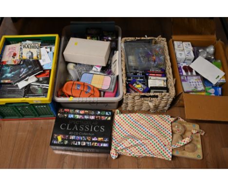 Four boxes of CDs, toys, ornaments, blank cassettes, light bulbs etc 