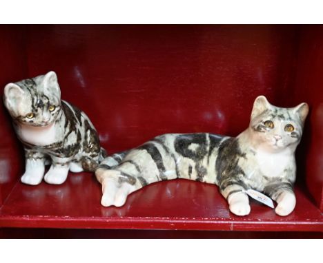 Two ceramic Winstanley style cats with glass eyes