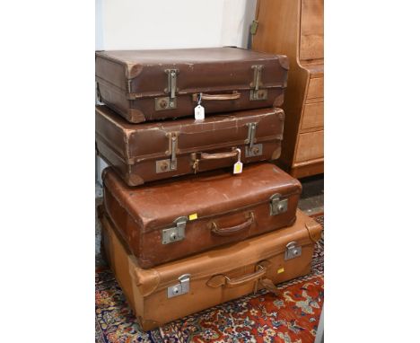 Four vintage suitcases