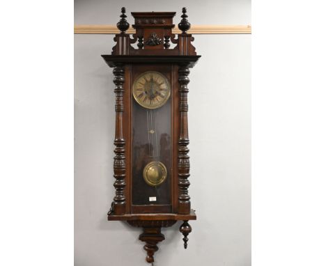 Ornate wall clock, +/- 100 cm long