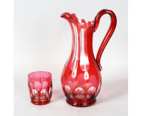 A GOOD VICTORIAN RUBY CLARET JUG AND BEAKER.