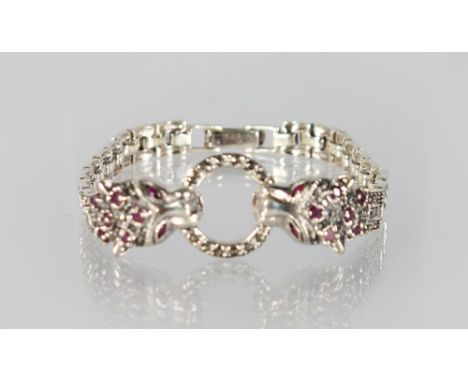 A SILVER, RUBY AND MARCASITE PANTHER BRACELET.