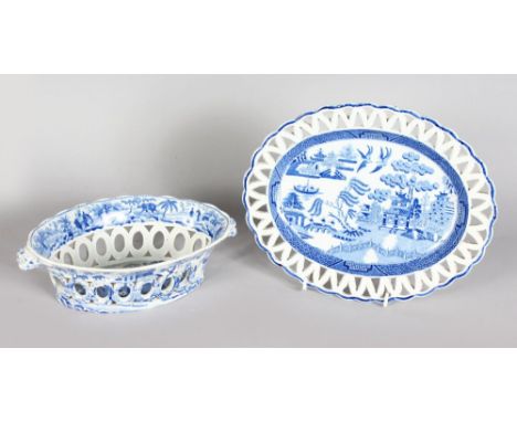 A SPODE BLUE AND WHITE PIERCED OVAL CHESTNUT BASKET AND STAND. 9ins wide.