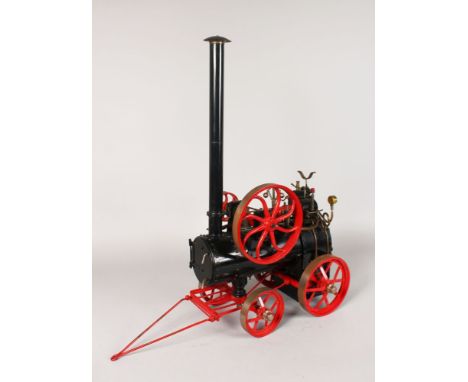 A Superbly Well Engineered Live Steam Scale Model of a portable Marshall traction engine or steam tractor.  Inmblack with bra