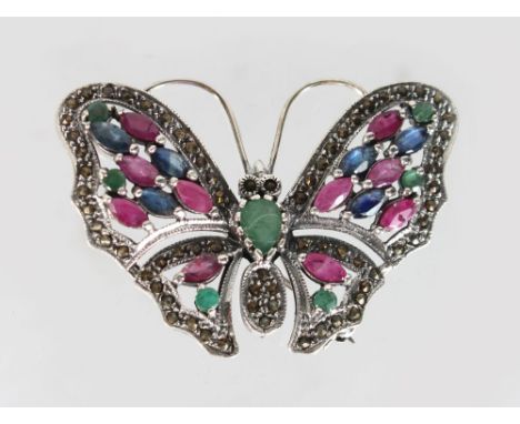A SILVER RUBY SAPPHIRE AND EMERALD BUTTERFLY BROOCH.