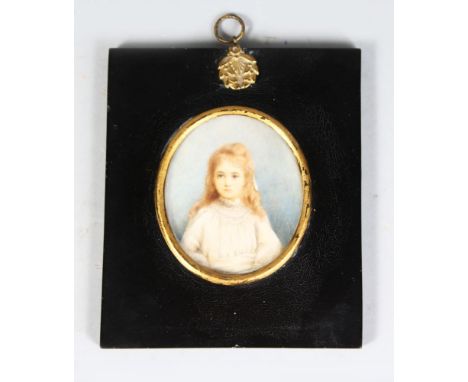 AN OVAL PORTRAIT OF A YOUNG GIRL, HALF LENGTH, wearing a white dress 3ins x 2.5ins, framed and glazed 5.5ins x 4.5ins.