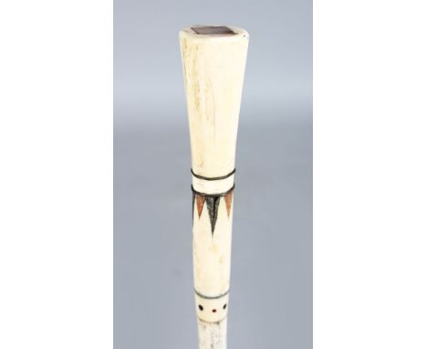 A 19TH CENTURY MARINE IVORY SAILORS SCRIMSHAW WHALEBONE WALKING STICK, POSSIBLY NORTH AMERICAN, the Handle Carved from a Sper