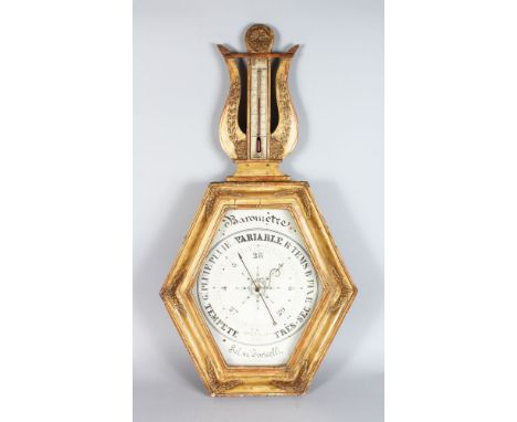 A FRENCH RESTORATION PERIOD GILT FRAMED HEXAGONAL BAROMETER with LYRE SHAPED THERMOMETER. 36ins long.