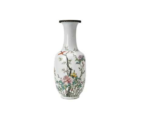 FAMILE ROSE BALUSTER VASE  QING DYNASTY, 19TH CENTURY the baluster sides painted with an exotic bird perched amidst brightly 