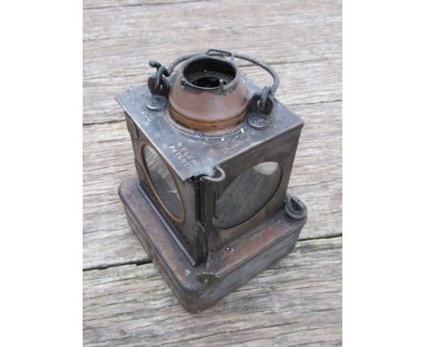 Two railway signal lamp interiors brass brass and metal burners, both stamped LNER