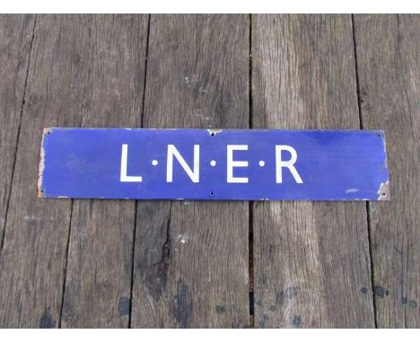 An enamel LNER blue and white poster board heading sign, 71cm x 14.5cm