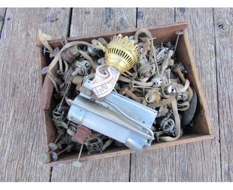 A pine box of various lamp burners and wicks 