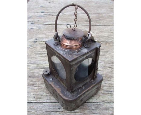 A B.R (E) railway signal lamp interior with reservoir and brass burner (one aspect damaged)