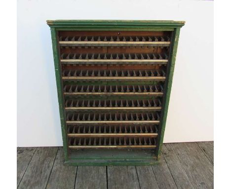 A green painted railway station office ticket cabinet 