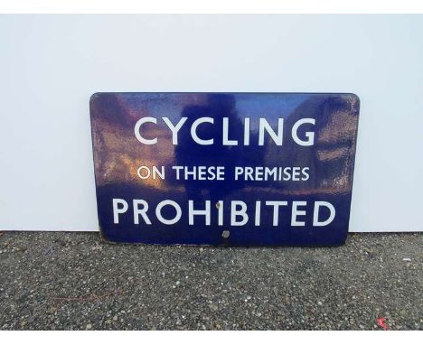 A B.R (E) enamel Station sign "CYCLING ON THESE PREMISES PROHIBITED", fully flanged, 76cm x 45.5cm