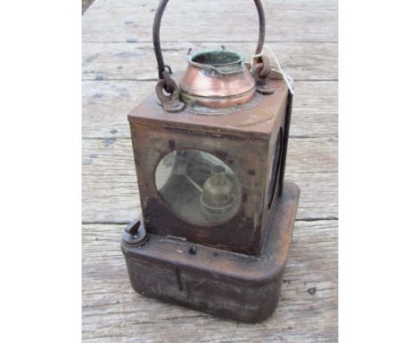 A B.R (E) railway signal lamp interior with reservoir and brass burner