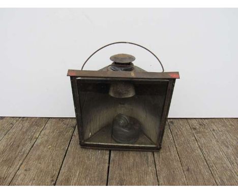 A metal cased 'Adlake' non-sweating large railway yard lamp with reservoir and triple burners