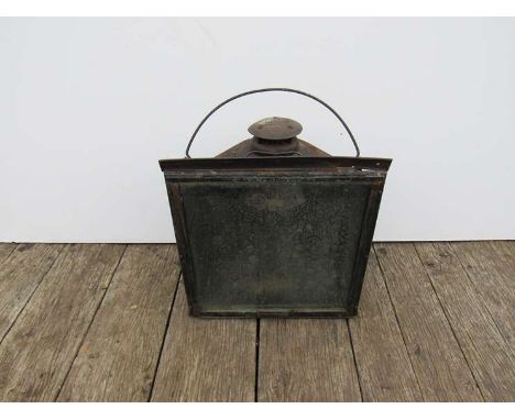 A metal cased 'Adlake' non-sweating large railway yard lamp with reservoir and triple burners