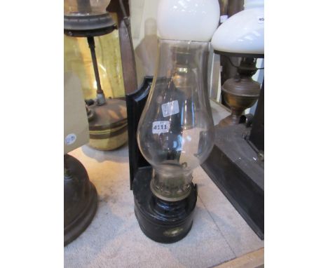 A painted tin wall mounted railway waiting room oil lamp with glass chimney  