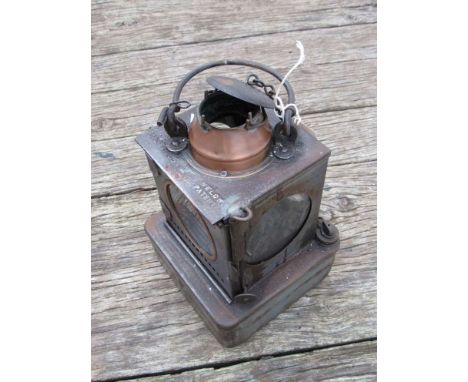 A B.R (E) railway signal lamp interior, with reservoir and brass burner