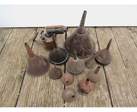 A group of various sized railway oil funnels, one stamped B.R (E) and a lidded cup and a blow lamp a/f  (13)