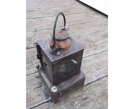 An LNER railway signal lamp interior with reservoir and burner 