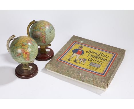 Chad Valley tin plate globe, 21cm high, together with Crawford tin plate globe and a John Bull Printing Outfit, (3)