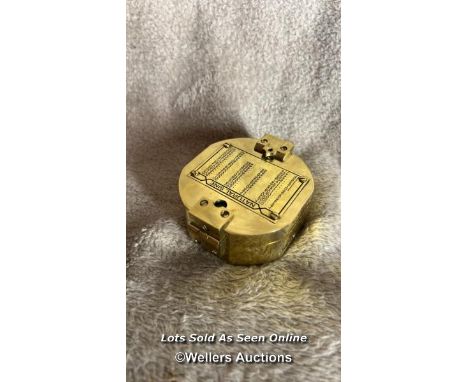 20th C marching compass  A fine quality marching compass in polished brass a great desk display item 8cm wide x 3cm h 