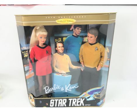A Boxed Mattel Star Trek Barbie And Ken Gift Set.
