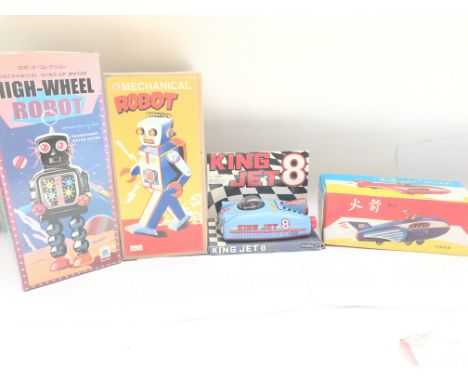 A Collection of Boxed Chinese Tin Plate Toys including a High-Wheel Robot. A Mechanical Robot. A King Jet 8 and a Rocket Race