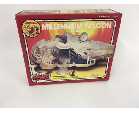 Vintage Star Wars Millennium Falcon from the Micro collection by Kenner. In original box complete with six die cast figures. 