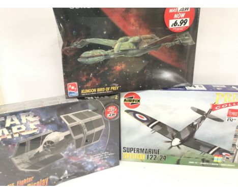 3 x model kits Kits Including.A AMT Star Wars Tie Fighter. A Star Trek Klingon Bird Of Prey and a Airfix Spitfire.
