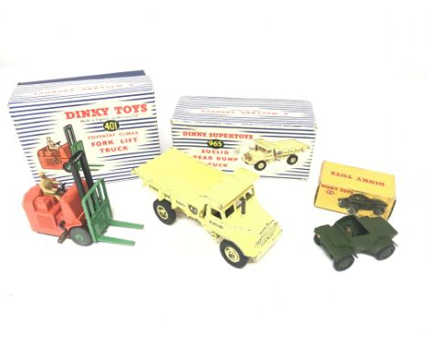 A Boxed Dinky Toys Fork Lift Truck #401 A/F. A Euclid Rear Dump Truck #965 and a Scout Car #673.