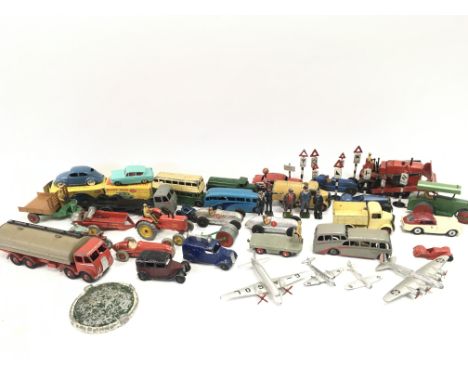 A Collection of Playworn Dinky Toys Including a Boxed Dinky Volkswagen #181 and a Ford Anglia #155.