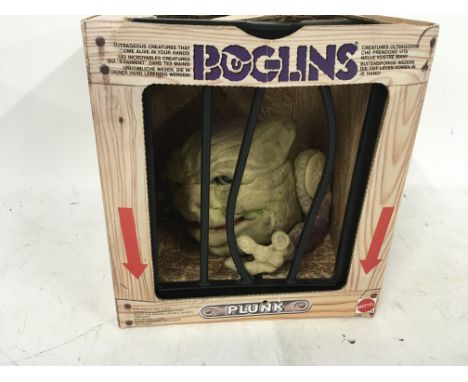 Mattel Boglins in original packaging with cage front. Nameplate reads Plunk..no perishing noted.